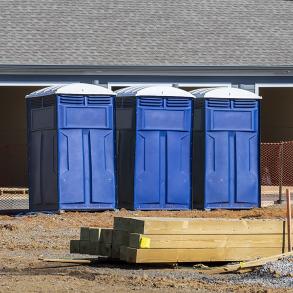 what is the cost difference between standard and deluxe porta potty rentals in Trumbauersville